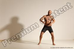 Underwear Gymnastic poses Man Black Muscular Bald Dancing Dynamic poses Academic